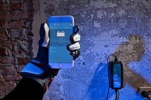 Choosing the Best Charger for Your Lithium Battery 1 Best lithium battery Charger: An ACDC charger plugged into a mains power outlet, monitored via Bluetooth for efficient home charging